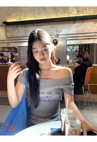 gray off-shoulder top
