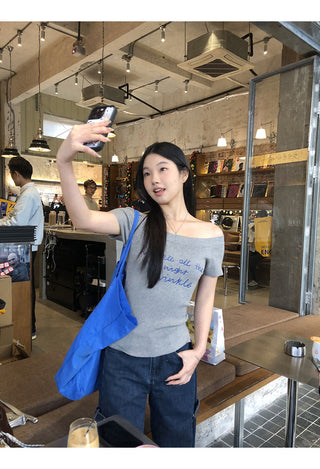 gray off-shoulder top