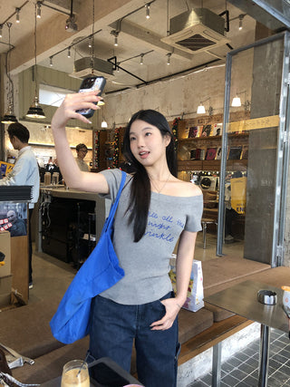 gray off-shoulder top