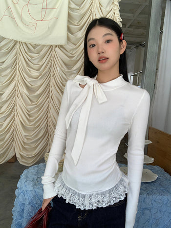 white long sleeve top