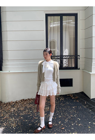 white long sleeve top