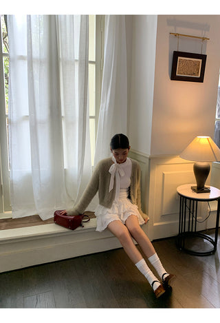 white long sleeve top
