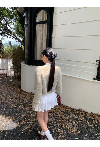 white long sleeve top