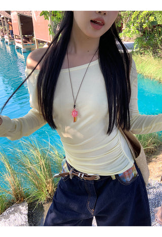 yellow oblique shoulder top