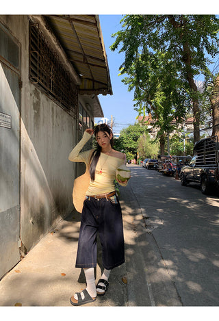 yellow oblique shoulder top