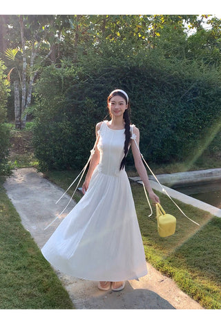 white sleeveless dress