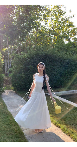 white sleeveless dress