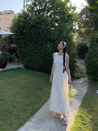 white sleeveless dress