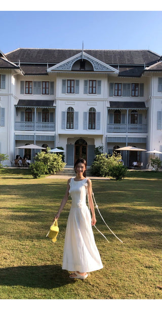 white sleeveless dress