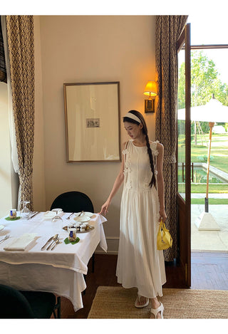 white sleeveless dress