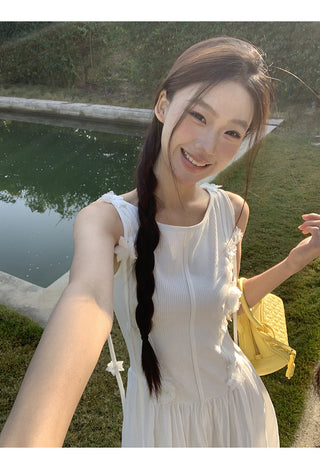 white sleeveless dress