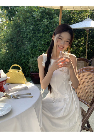 white sleeveless dress