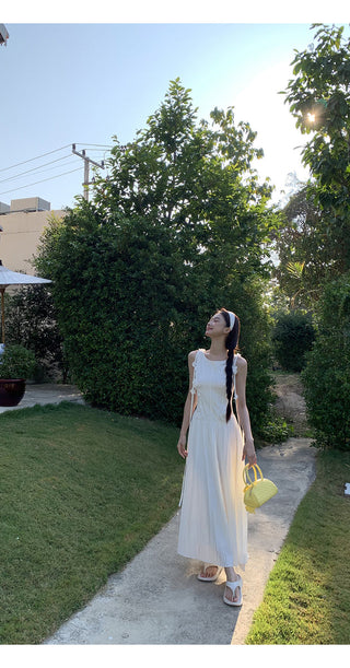 white sleeveless dress