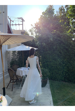 white sleeveless dress