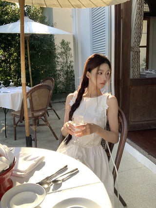 white sleeveless dress