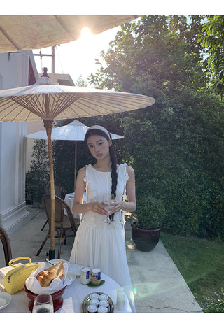 white sleeveless dress