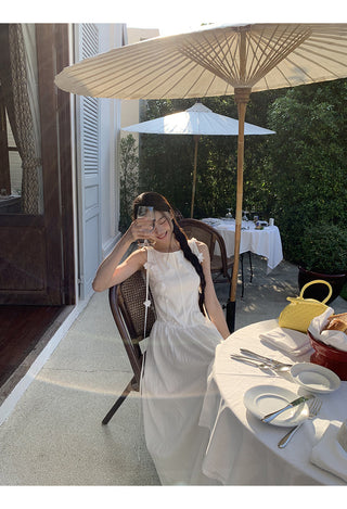 white sleeveless dress