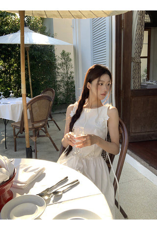 white sleeveless dress
