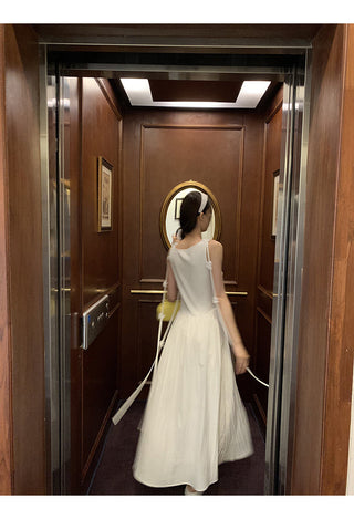 white sleeveless dress