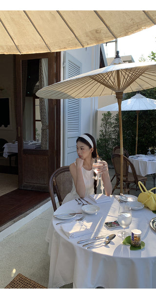white sleeveless dress