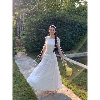 white sleeveless dress