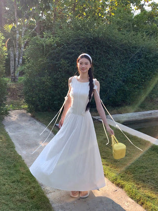 white sleeveless dress