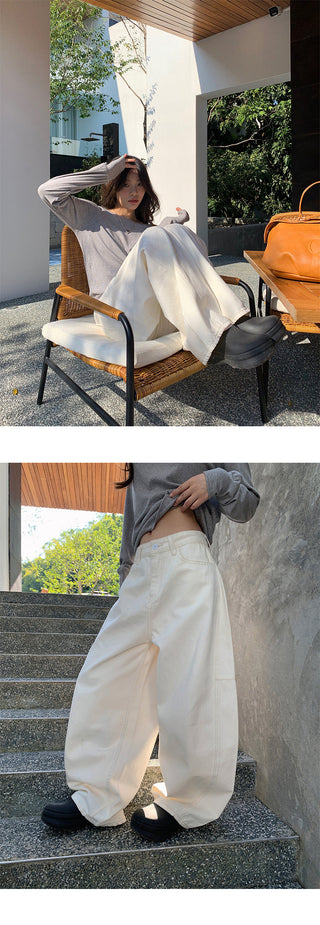 Deconstructed wide-leg jeans