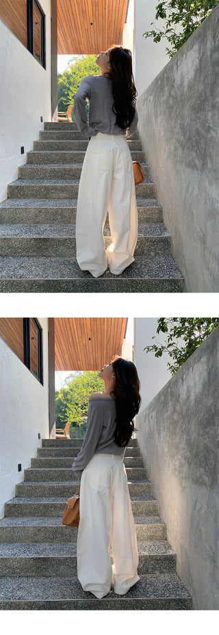 Deconstructed wide-leg jeans