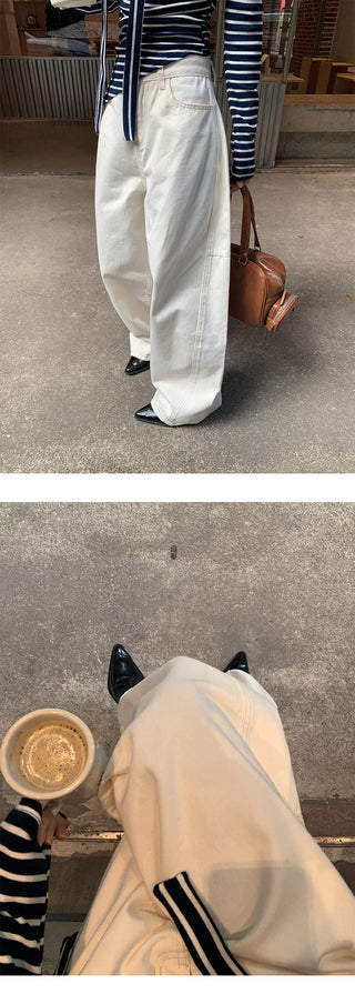 Deconstructed wide-leg jeans