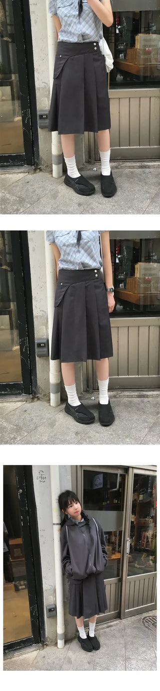 Belted pleated skirt