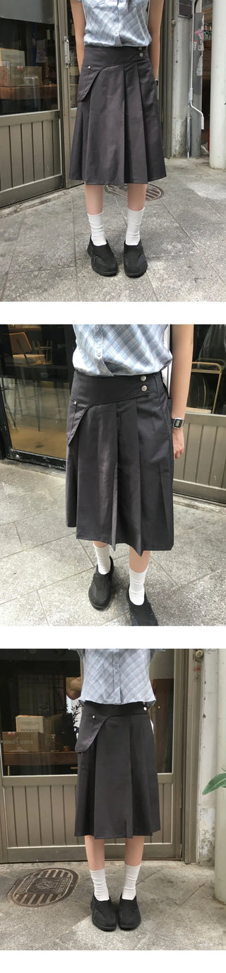 Belted pleated skirt