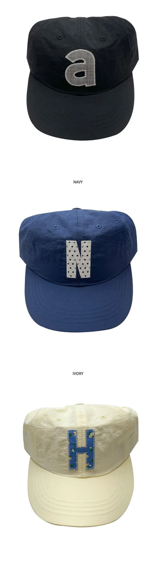Dot Alphabet Cap