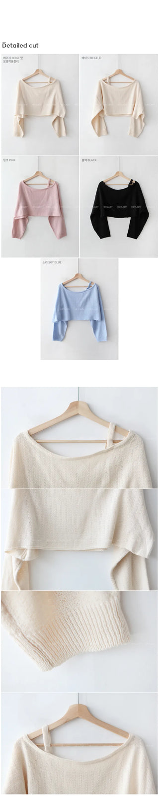 Asymmetrical boat neck cropped knit