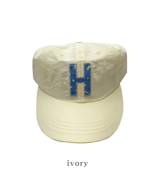 Dot Alphabet Cap