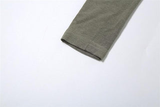 Long sleeve irregular hollow out ruched solid cut out top