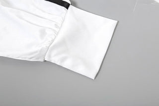 Irregular long sleeve self tie print contrast top