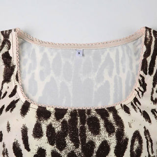 Leopard print long sleeve u neck lace hem top