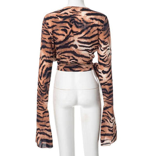 Slit long flared sleeve self tie tiger print cowl neck top