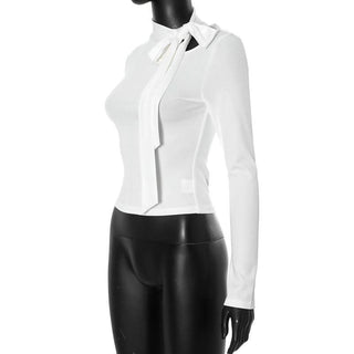 Hollow out bowknot self tie long sleeve solid cut out top