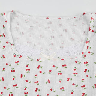 Cap sleeve textured cherry print bowknot lace hem top