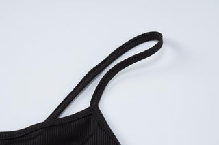 Solid ribbed cross back long sleeve shrug romper