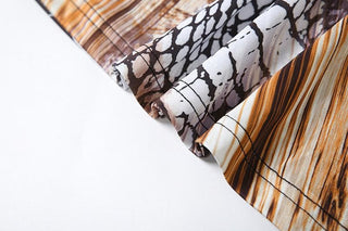 Hollow out snakeskin print halter self tie cut out maxi dress