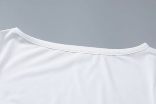 Long flared sleeve crewneck irregular solid top