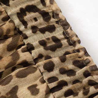 Halter cross front leopard print ruffle mini dress