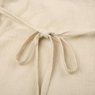 Textured v neck flared sleeve self tie top
