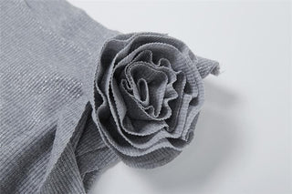 Crewneck flower applique glitter ruffle top