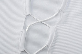 Lace up solid long sleeve ribbed self tie mini dress