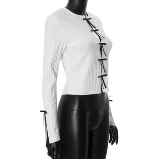 Long sleeve slit hollow out bowknot textured cut out top