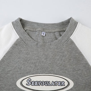 Short sleeve contrast letter pattern top