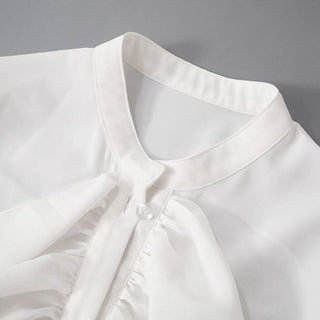 Long flared sleeve ruched ruffle button solid top